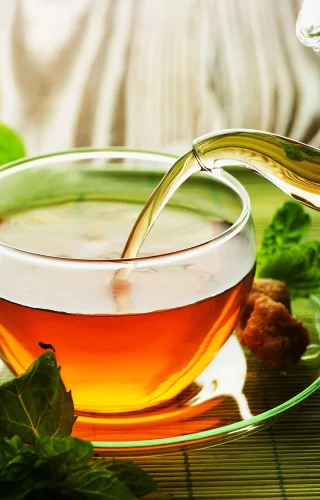 Pouring-Herbal-Tea.webp Pouring-Herbal-Tea.webp